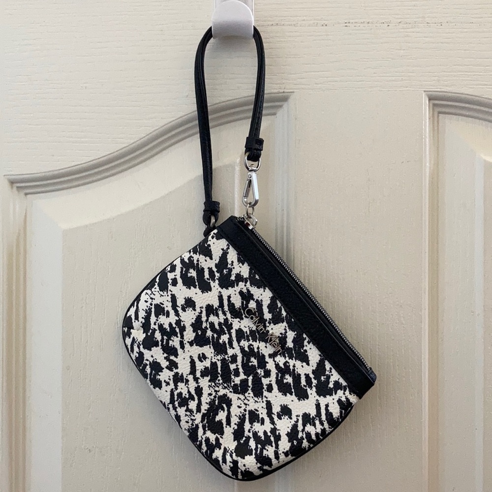 FINAL MARKDOWN Ladies’ Calvin Klein wristlet